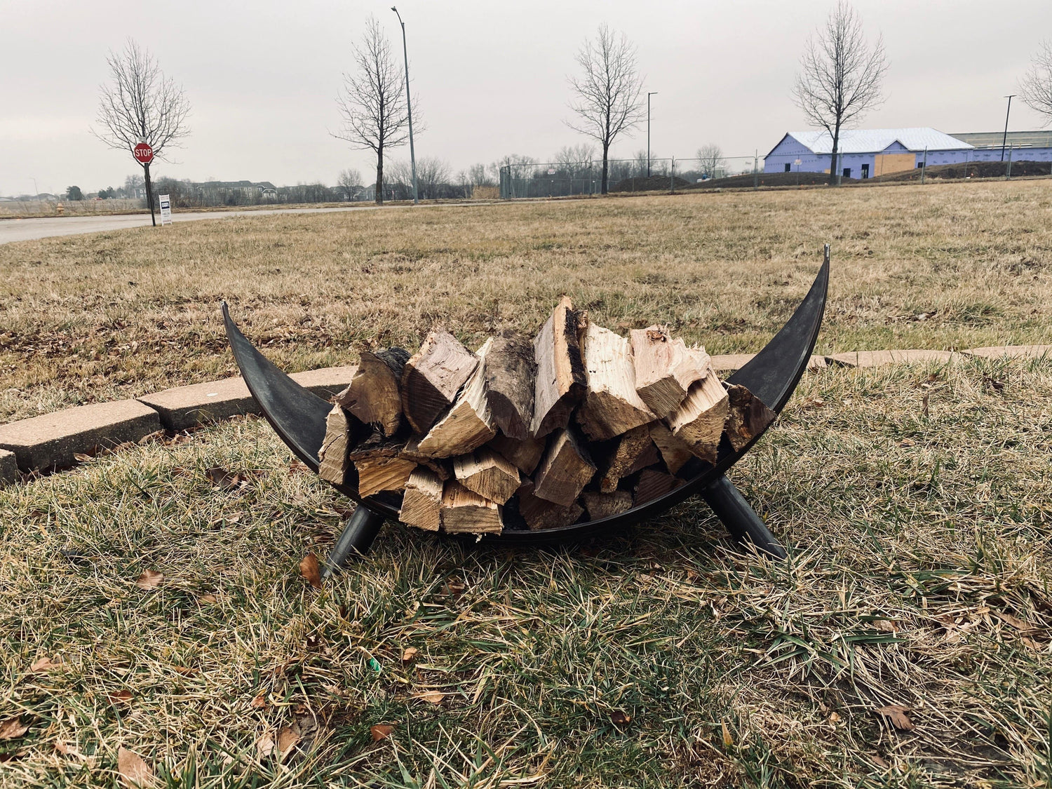 Fire Wood Holder with Fire Wood Spaced In It - Front View - Rough & Rigid