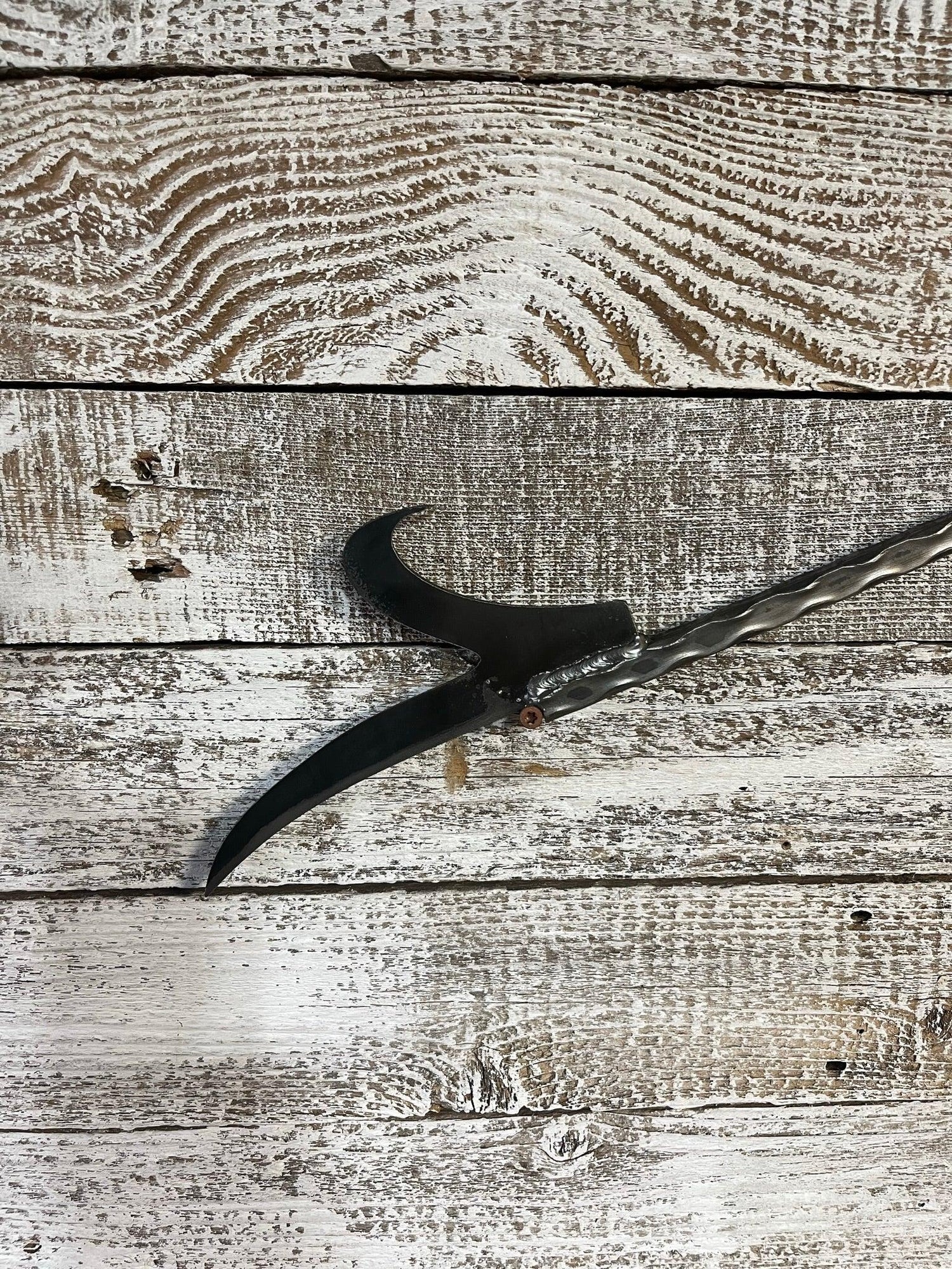 Fire Poker Poking End Close Up View - Rough & Rigid
