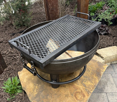 The Duke Fire Pit 30" With Tilting Base Top Side view with a grill top 